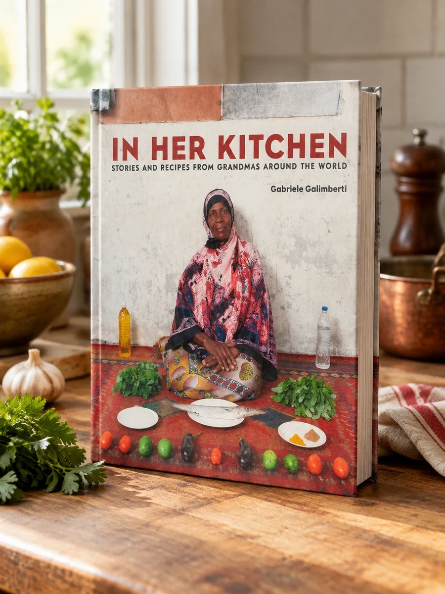 In Her Kitchen: Stories and Recipes from Grandmas Around the World: A Cookbook